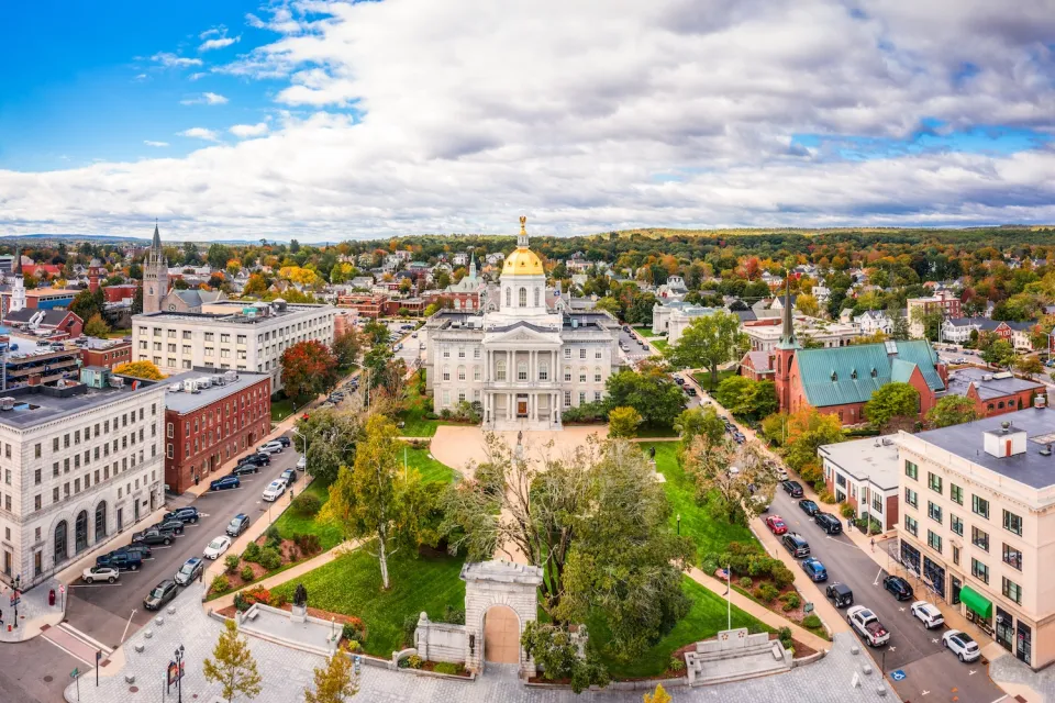 Aerial vew of New Hampshire state capitol with gold dome in Concord, New Hampshire.